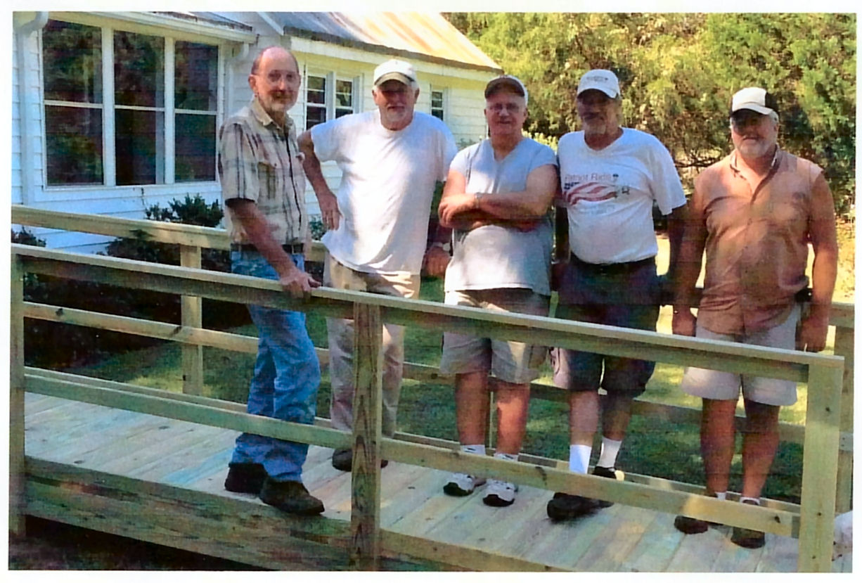 picture of men standing on a ramp they built